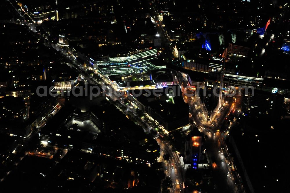 Aerial image at night Berlin - Night view at the Hardenbergplatz and the Kurfürstendamm in the district Charlottenburg in Berlin. The Hardenbergplatz is a sub center in the City West