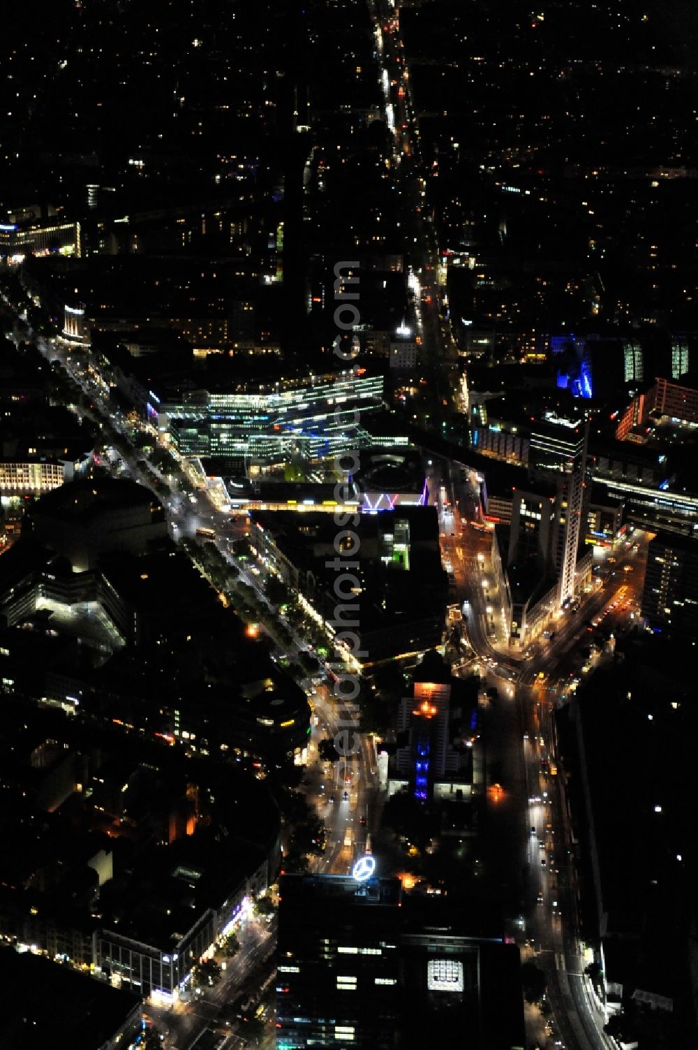 Berlin at night from above - Night view at the Hardenbergplatz and the Kurfürstendamm in the district Charlottenburg in Berlin. The Hardenbergplatz is a sub center in the City West