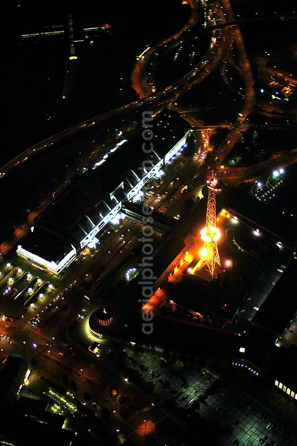 Aerial photograph at night Berlin - Blick auf den Berliner Funkturm und das Messegelände mit dem ICC bei Nacht.