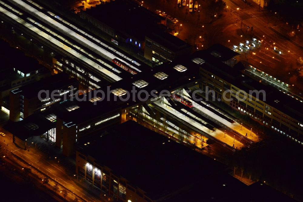 Potsdam at night from the bird perspective: Night aerial image of the main station in Potsdam in the state Brandenburg