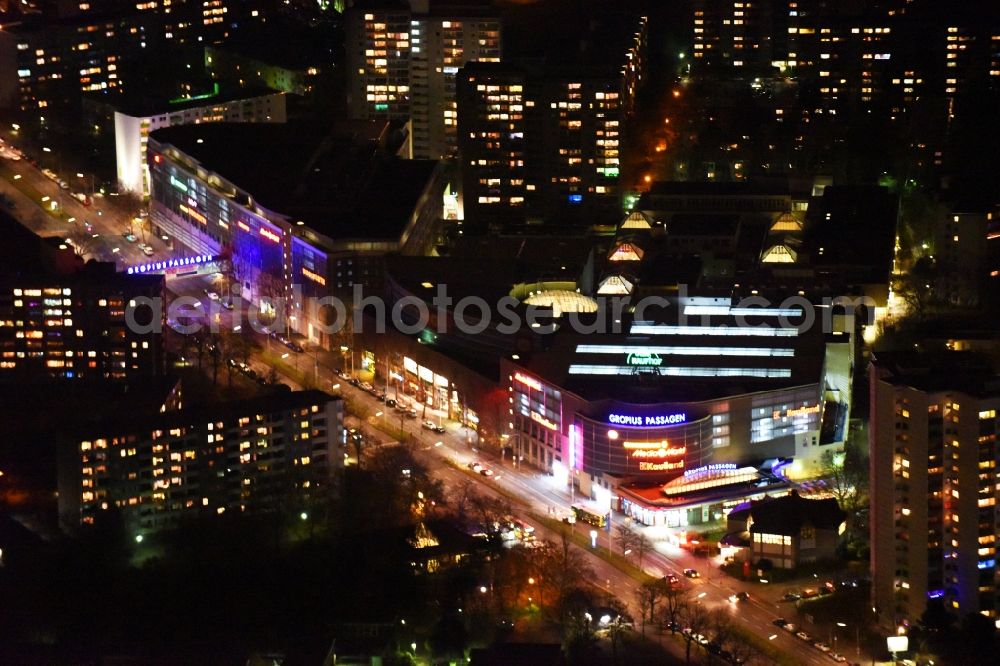 Aerial image at night Berlin - Night aerial view from the shopping center Gropiuspassagen coherent with night lighting. The shopping center is located in the Neukoelln district at the Johannisthaler Chaussee in Berlin