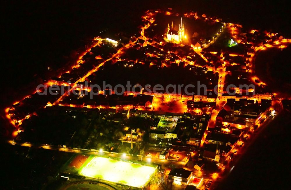 Werder (Havel) at night from above - Night lighting city view on the river bank the Havel in the district Geltow in Werder (Havel) in the state Brandenburg, Germany