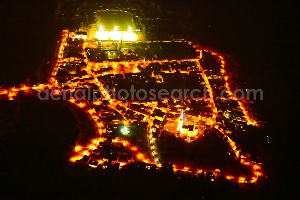 Werder (Havel) at night from the bird perspective: Night lighting city view on the river bank the Havel in the district Geltow in Werder (Havel) in the state Brandenburg, Germany