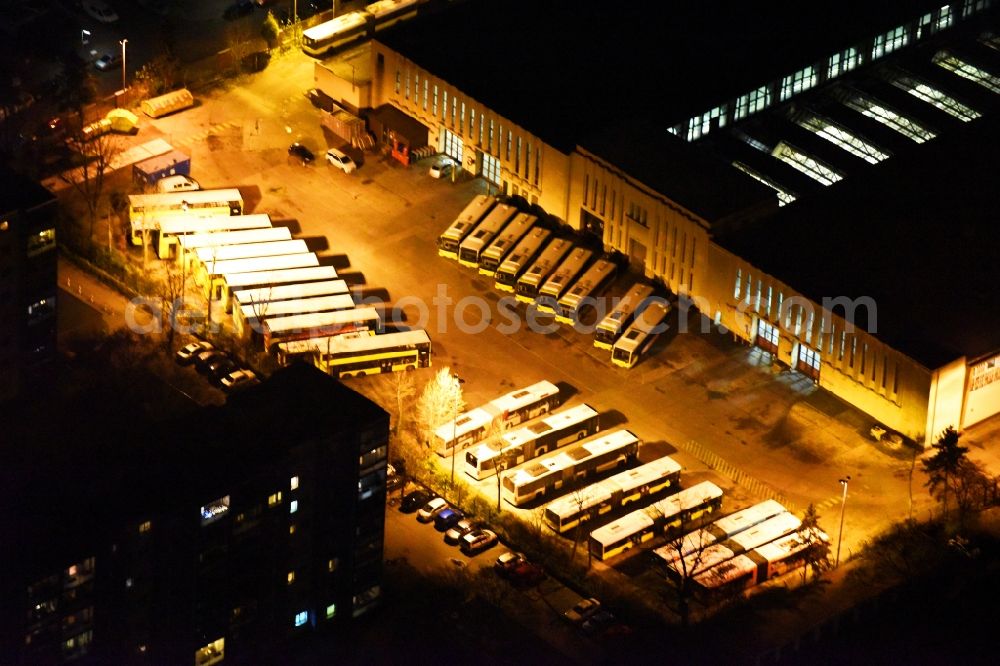 Aerial image at night Berlin - Night view depot of the Municipal Transport Company BVB Am Strassenbahnhof - Gradestrasse im Stadtteil Neukoelln in Berlin