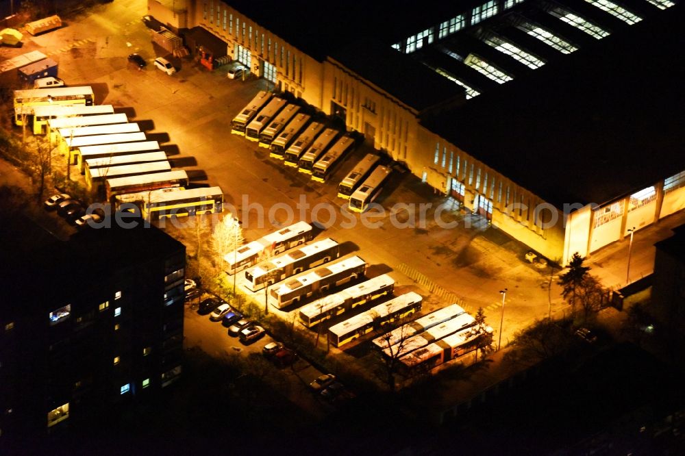 Berlin at night from above - Night view depot of the Municipal Transport Company BVB Am Strassenbahnhof - Gradestrasse im Stadtteil Neukoelln in Berlin