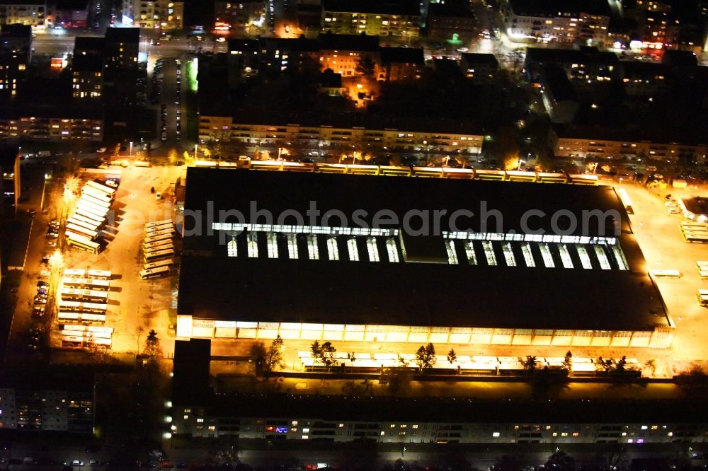 Aerial photograph at night Berlin - Night view depot of the Municipal Transport Company BVB Am Strassenbahnhof - Gradestrasse im Stadtteil Neukoelln in Berlin