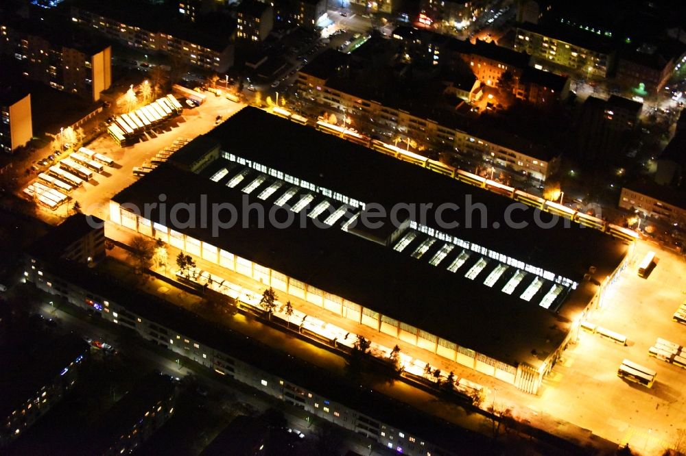 Berlin at night from above - Night view depot of the Municipal Transport Company BVB Am Strassenbahnhof - Gradestrasse im Stadtteil Neukoelln in Berlin