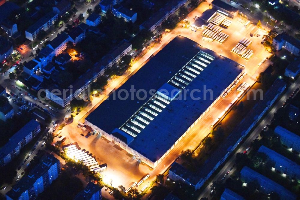 Aerial image at night Berlin - Night view depot of the Municipal Transport Company BVB Am Strassenbahnhof - Gradestrasse im Stadtteil Neukoelln in Berlin