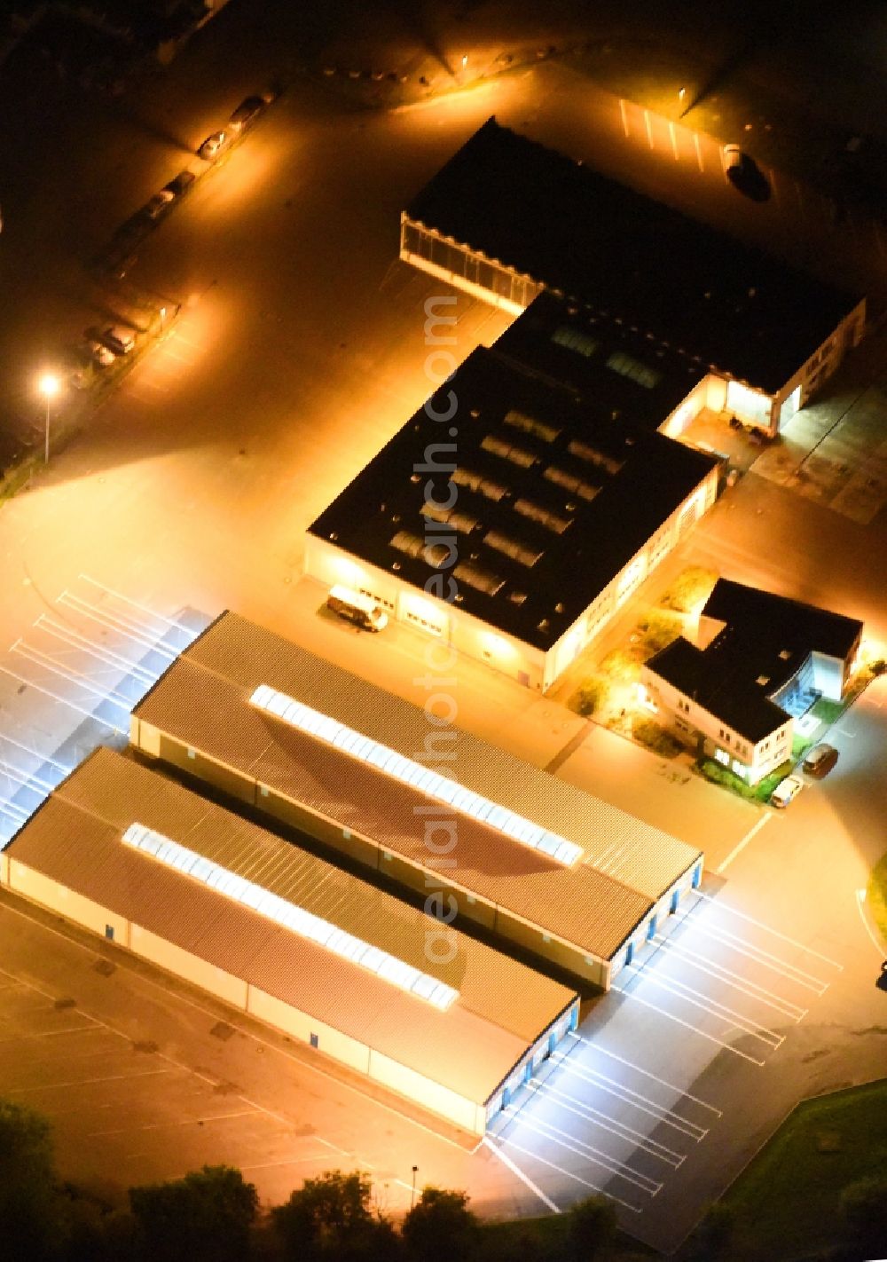 Neubrandenburg at night from above - Night lighting Depot of the Municipal Transport Company Neubrandenburger Verkehrsbetriebe GmbH in Neubrandenburg in the state Mecklenburg - Western Pomerania, Germany