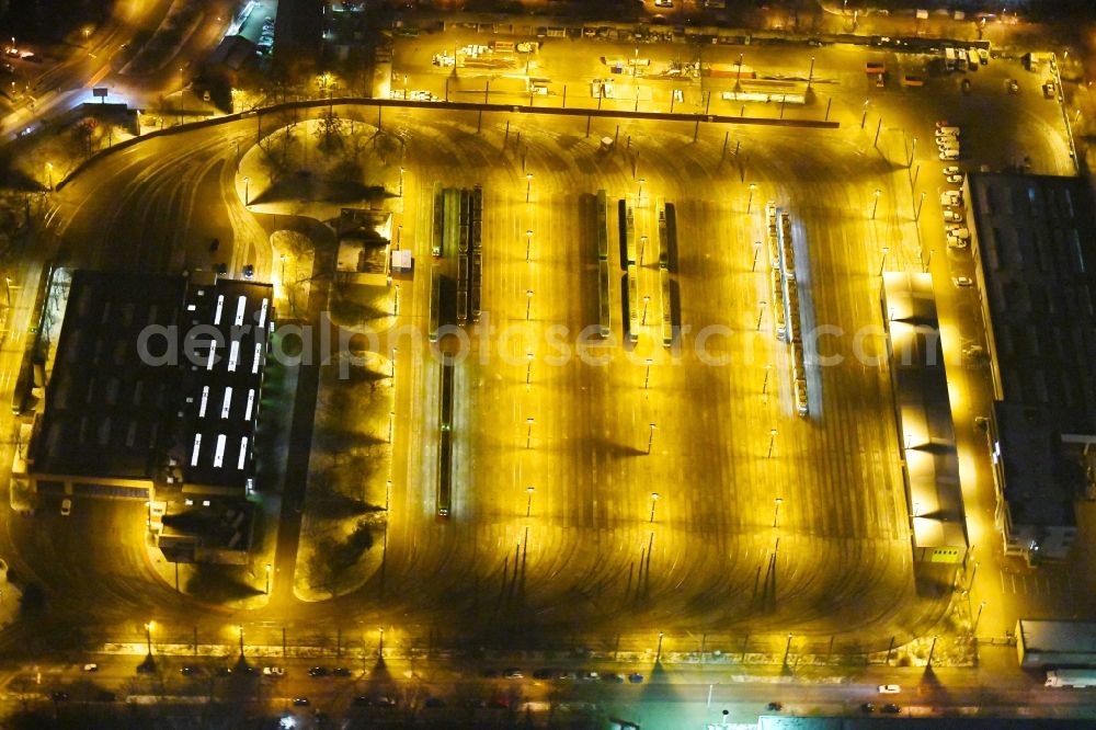 Aerial photograph at night Hannover - Night lighting Tram depot of the Municipal Transport Company of Stadtbahn Hannover on Thurnithistrasse in the district Doehren-Wuelfel in Hannover in the state Lower Saxony, Germany