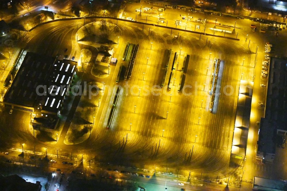 Aerial image at night Hannover - Night lighting Tram depot of the Municipal Transport Company of Stadtbahn Hannover on Thurnithistrasse in the district Doehren-Wuelfel in Hannover in the state Lower Saxony, Germany