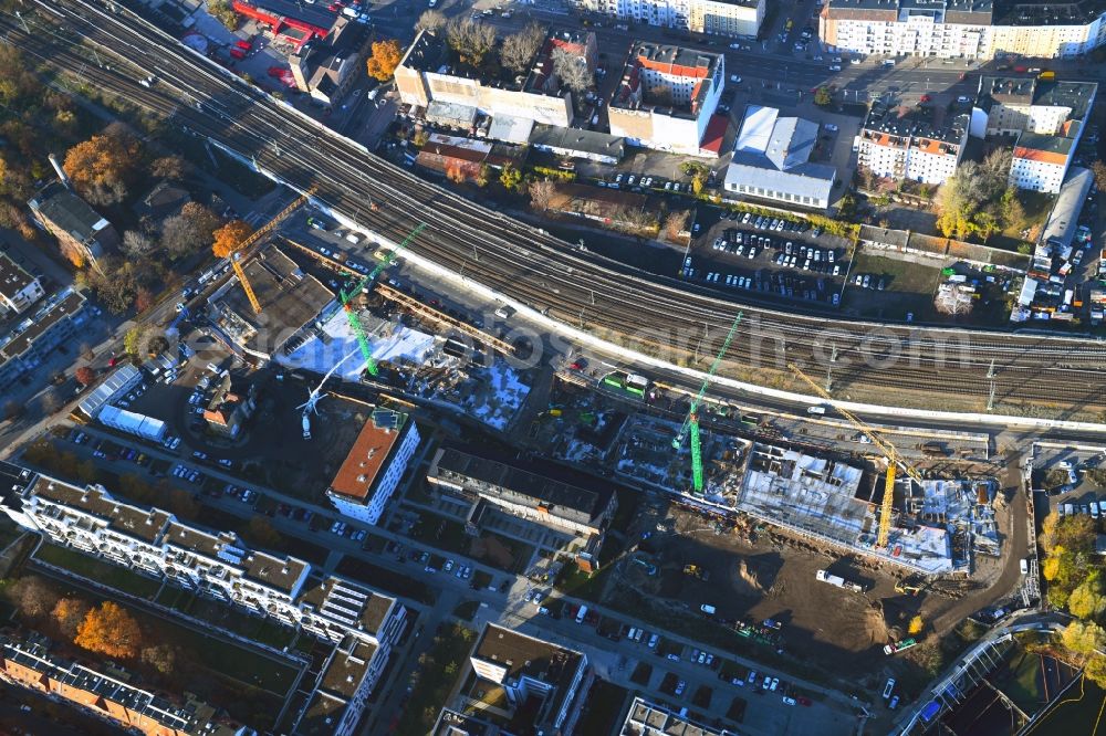 Aerial image at night Berlin - Night lighting Construction site to build a new office and commercial building B:HUB on Kynaststrasse - Alt-Stralau in Berlin, Germany