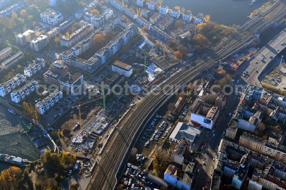 Aerial image at night Berlin - Night lighting Construction site to build a new office and commercial building B:HUB on Kynaststrasse - Alt-Stralau in Berlin, Germany