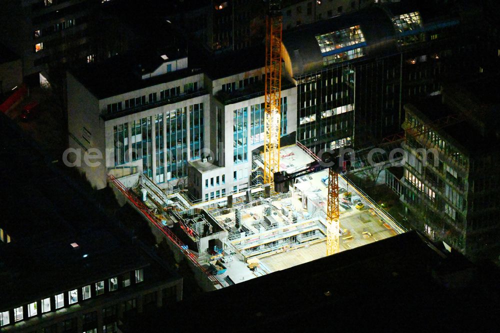 München at night from the bird perspective: Night lighting construction site to build a new office and commercial building Lichthoefe on street Denisstrasse in the district Maxvorstadt in Munich in the state Bavaria, Germany