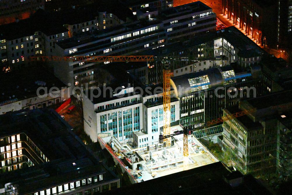 Aerial photograph at night München - Night lighting construction site to build a new office and commercial building Lichthoefe on street Denisstrasse in the district Maxvorstadt in Munich in the state Bavaria, Germany