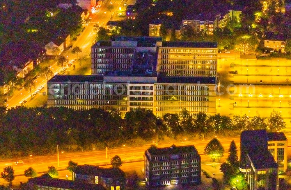 Aerial image at night Bochum - Night lighting office- and commercial building of Vonovia Zentrale in Bochum in the state North Rhine-Westphalia