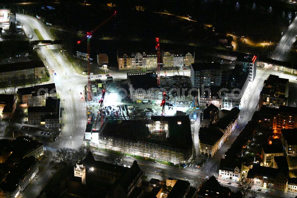 Aerial photograph at night Jena - Night lighting complementary new construction site on the campus-university building complex Campus Inselplatz on Loebdegraben - Steinweg in Jena in the state Thuringia, Germany