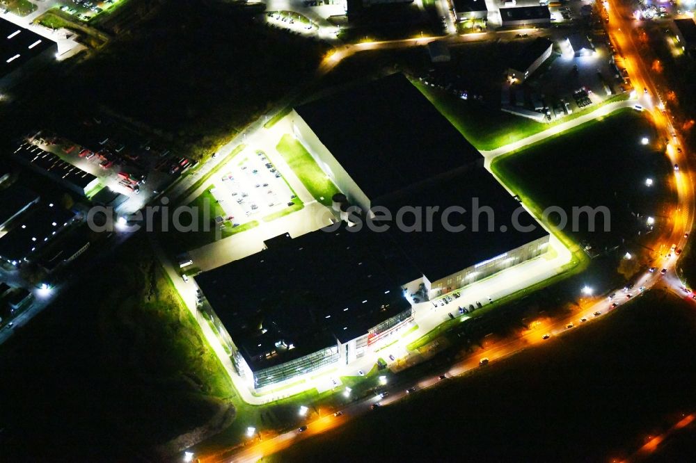 Hoppegarten at night from above - Night lighting View of the Europazentrale Clinton in Hoppegarten in the state of Brandenburg