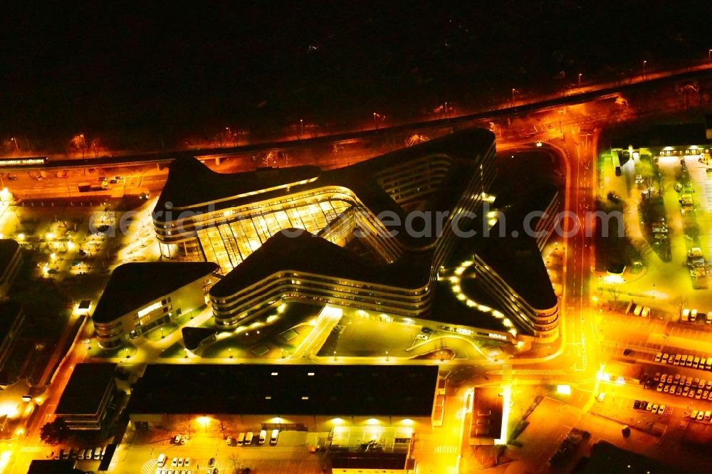 Köln at night from above - Night lighting administration building of the company RheinEnergie AG on Parkguertel in the district Ehrenfeld in Cologne in the state North Rhine-Westphalia, Germany