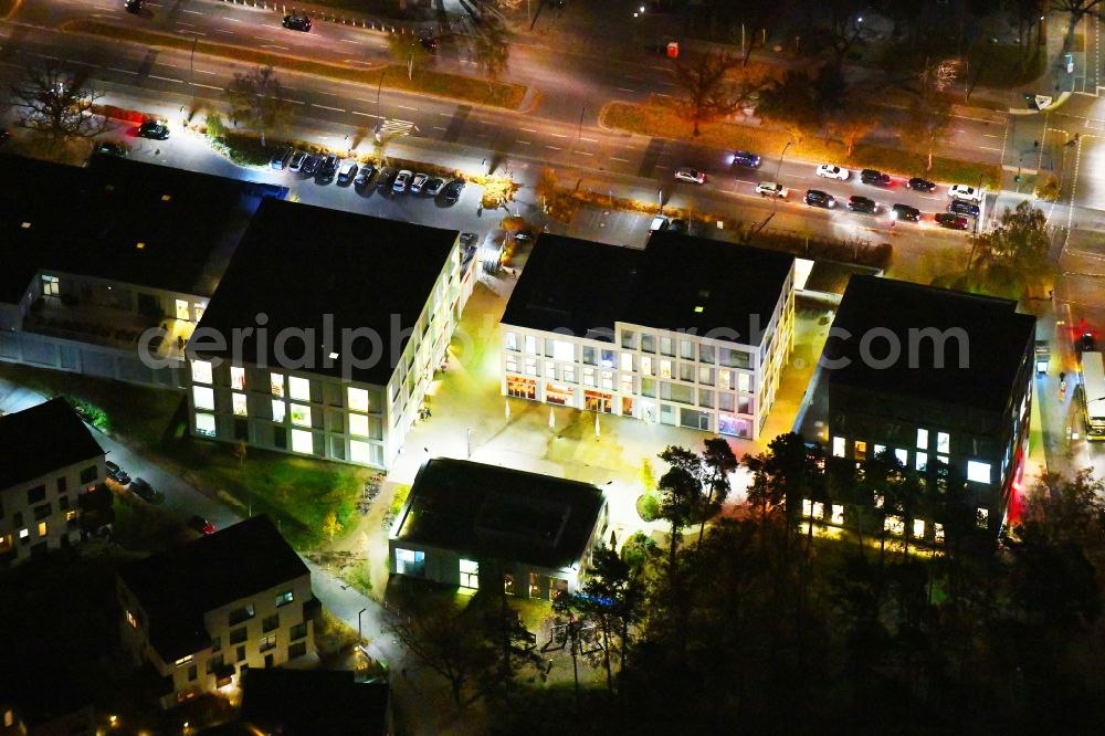 Berlin at night from the bird perspective: Night lighting building construction residential complex Five morning Dahlem Urban Village of STOFANEL group in Berlin