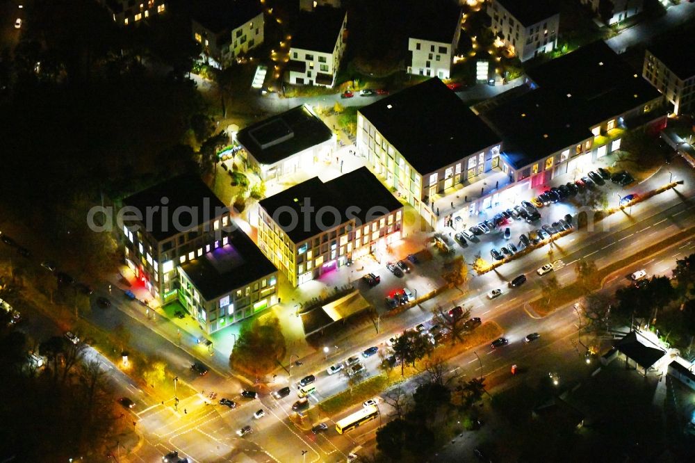 Aerial image at night Berlin - Night lighting building construction residential complex Five morning Dahlem Urban Village of STOFANEL group in Berlin