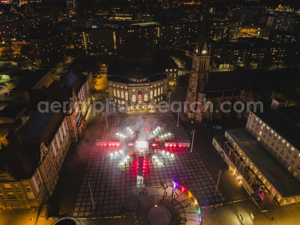 Chemnitz at night from above - Night lights and illumination of the Chemnitz Opera House with Theaterplatz on the occasion of the festival Illuminarium - the sound and light festival of film nights and the Petrikirche in Chemnitz in the federal state of Saxony