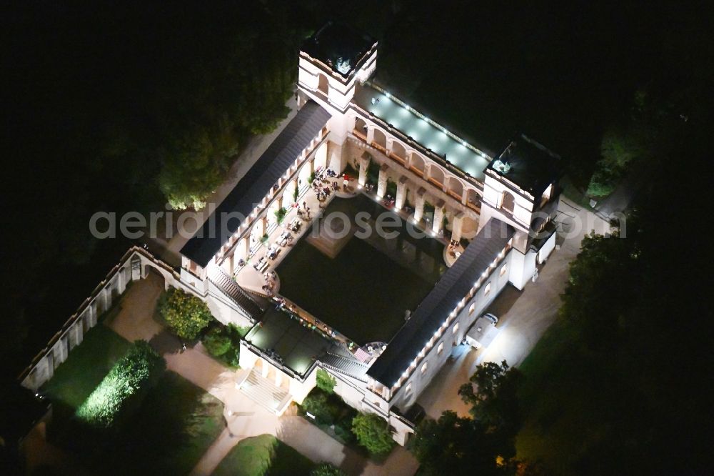 Potsdam at night from the bird perspective: Night lighting palace Belvedere on Pfingstberg on Night Castle Show in Potsdam in the state Brandenburg