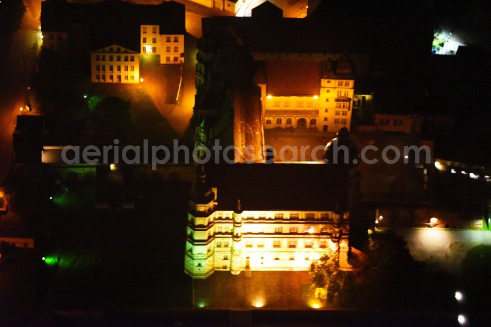 Aerial image at night Güstrow - Night lighting Palace in Guestrow in the state Mecklenburg - Western Pomerania, Germany