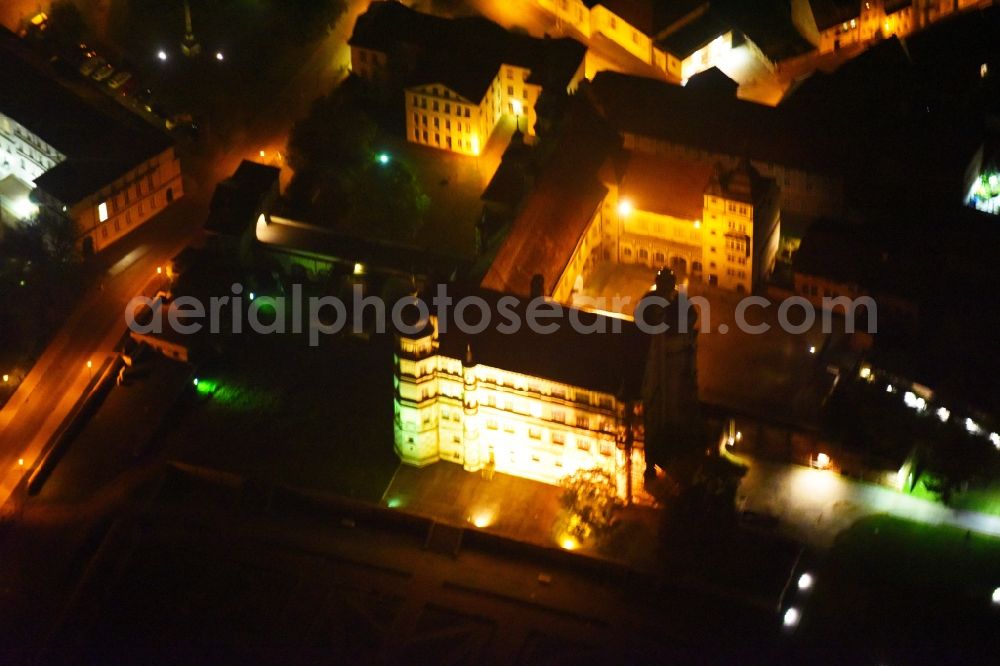 Güstrow at night from the bird perspective: Night lighting Palace in Guestrow in the state Mecklenburg - Western Pomerania, Germany