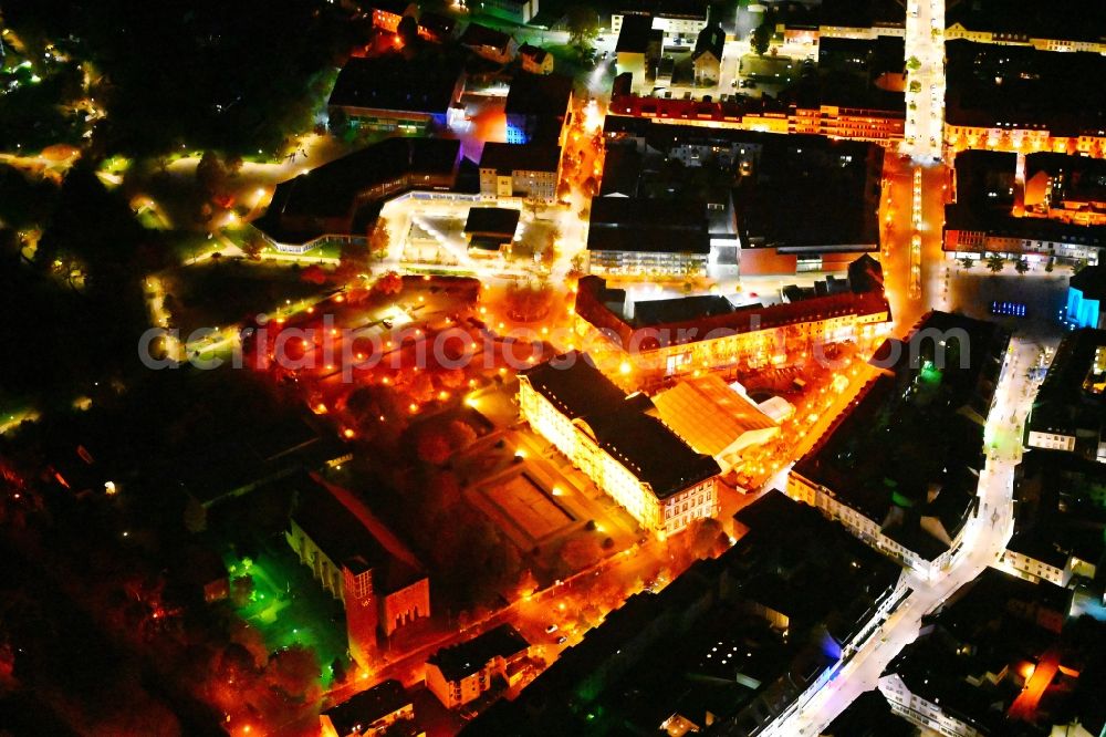 Zweibrücken at night from the bird perspective: Night lighting palace on place Schlossplatz in the state Rhineland-Palatinate, Germany