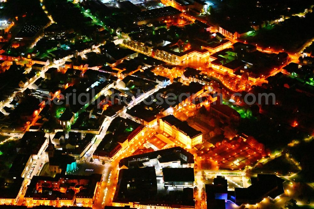 Zweibrücken at night from the bird perspective: Night lighting palace on place Schlossplatz in the state Rhineland-Palatinate, Germany