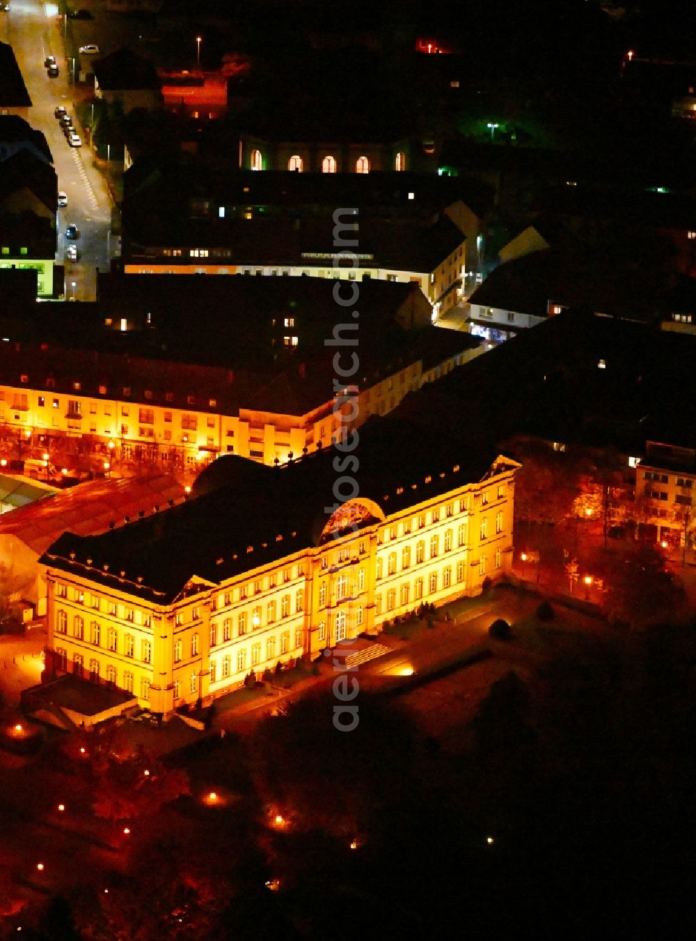 Zweibrücken at night from above - Night lighting palace on place Schlossplatz in the state Rhineland-Palatinate, Germany