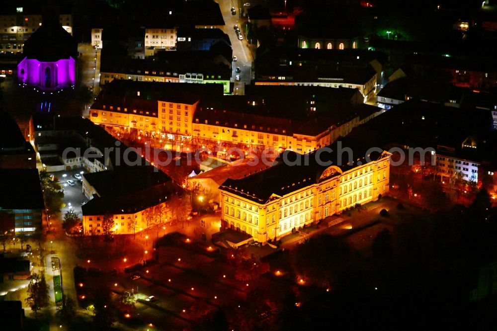 Zweibrücken at night from the bird perspective: Night lighting palace on place Schlossplatz in the state Rhineland-Palatinate, Germany