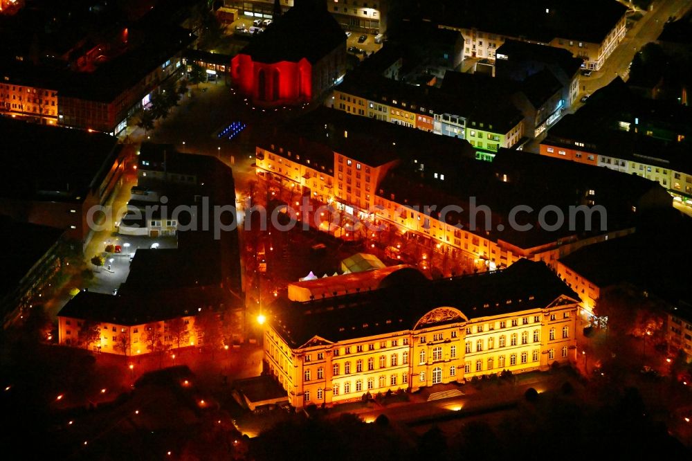 Zweibrücken at night from the bird perspective: Night lighting palace on place Schlossplatz in the state Rhineland-Palatinate, Germany