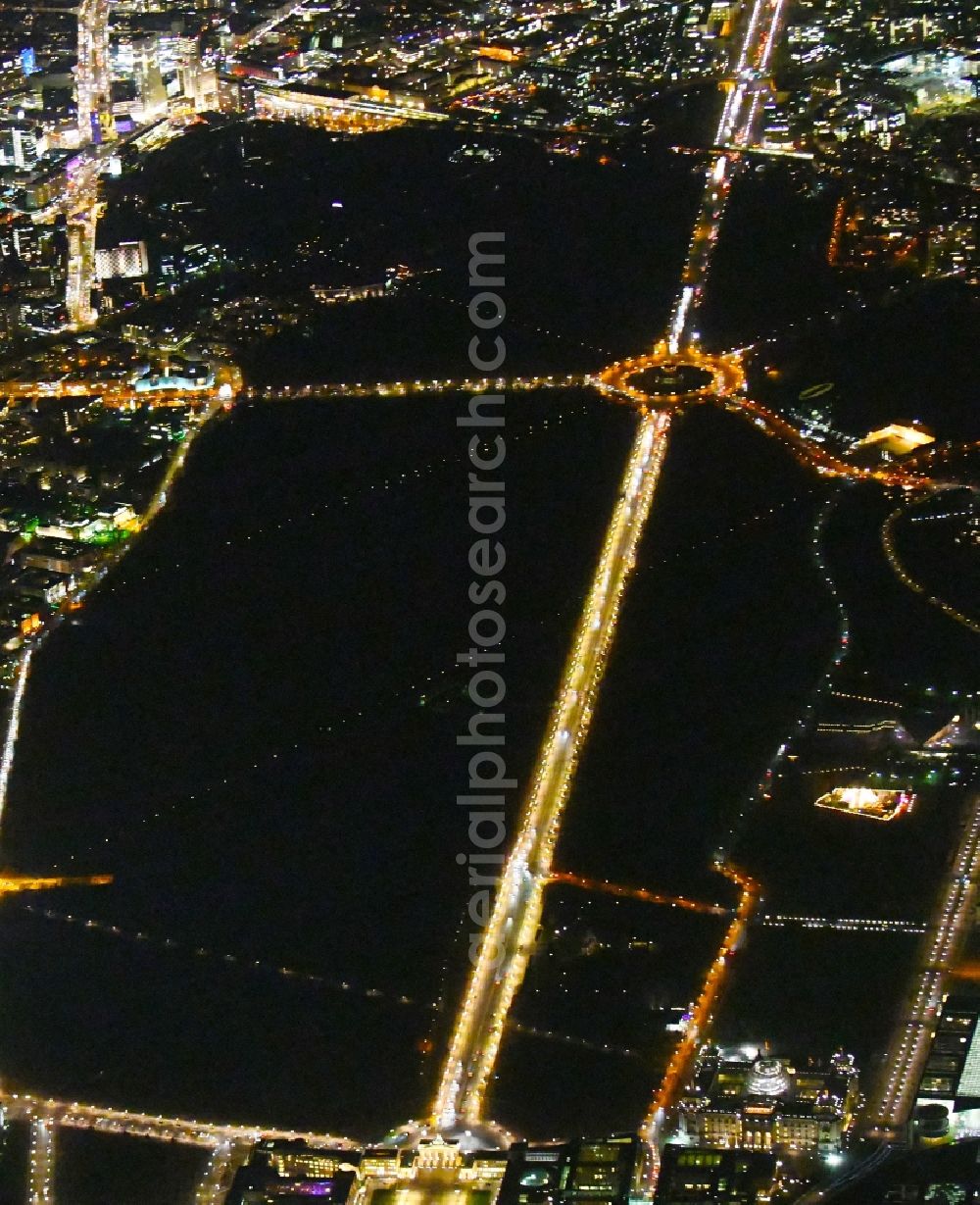 Aerial image at night Berlin - Night lighting Park of along the Str. of 17.Juni in the district Tiergarten in Berlin, Germany