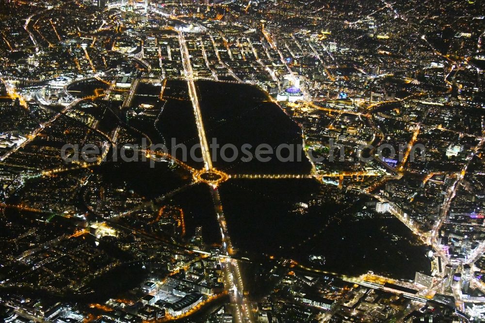 Aerial image at night Berlin - Night lighting Park of Tiergarten - Strasse of 17. Juni - Siegessaeule - Grosser Stern in the district Tiergarten in Berlin, Germany