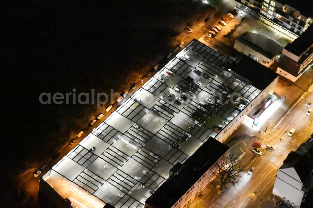 Aerial image at night Potsdam - Night view parking deck on the building of the car park Kaufland Zeppelinstrasse in the district Westliche Vorstadt in Potsdam in the state Brandenburg