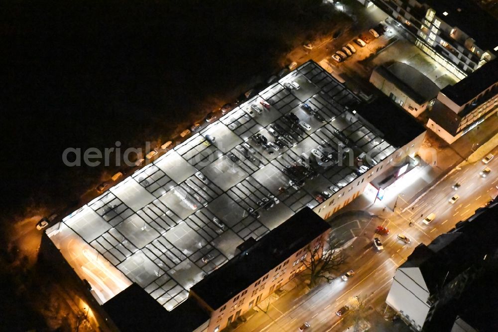 Potsdam at night from above - Night view parking deck on the building of the car park Kaufland Zeppelinstrasse in the district Westliche Vorstadt in Potsdam in the state Brandenburg