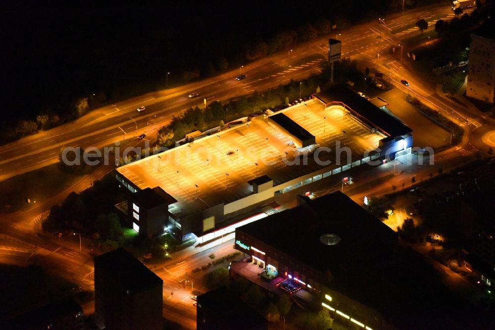 Aerial image at night Neubrandenburg - Night lighting Parking deck on the building of the car park Lindetal Center on Juri-Gagarin-Ring in Neubrandenburg in the state Mecklenburg - Western Pomerania, Germany