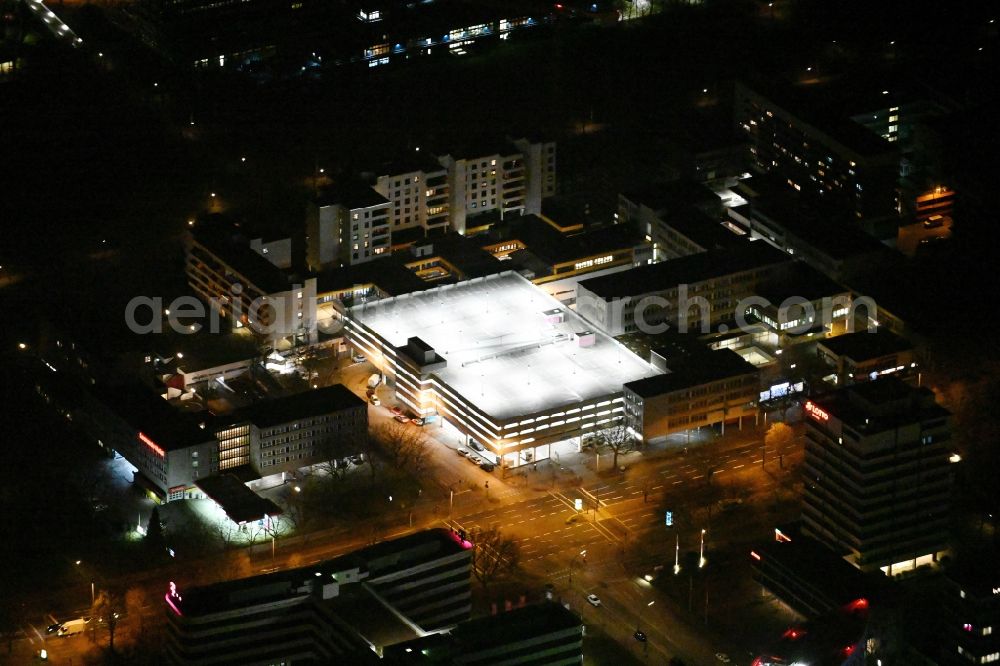 Hamburg at night from above - Night lighting parking deck on the building of the car park Park-n-Fly on Ueberseering in the district Winterhude in Hamburg, Germany