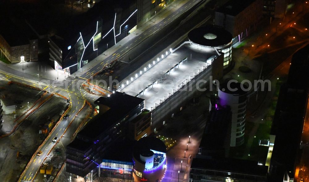 Karlsruhe at night from the bird perspective: Night lighting parking deck on the building of the car park Parkhaus in Scheck-In Center on Rueppurrer Strasse in Karlsruhe in the state Baden-Wurttemberg, Germany