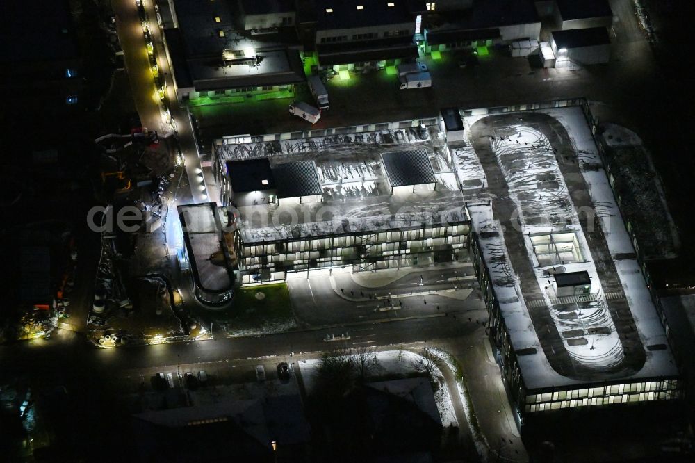 Lübeck at night from above - Night lighting parking deck on the building of the car park in UKSH Universitaetsklinikum Schleswig-Holstein in the district Strecknitz in Luebeck in the state Schleswig-Holstein, Germany