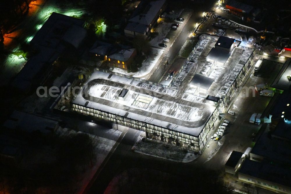 Lübeck at night from above - Night lighting parking deck on the building of the car park in UKSH Universitaetsklinikum Schleswig-Holstein in the district Strecknitz in Luebeck in the state Schleswig-Holstein, Germany