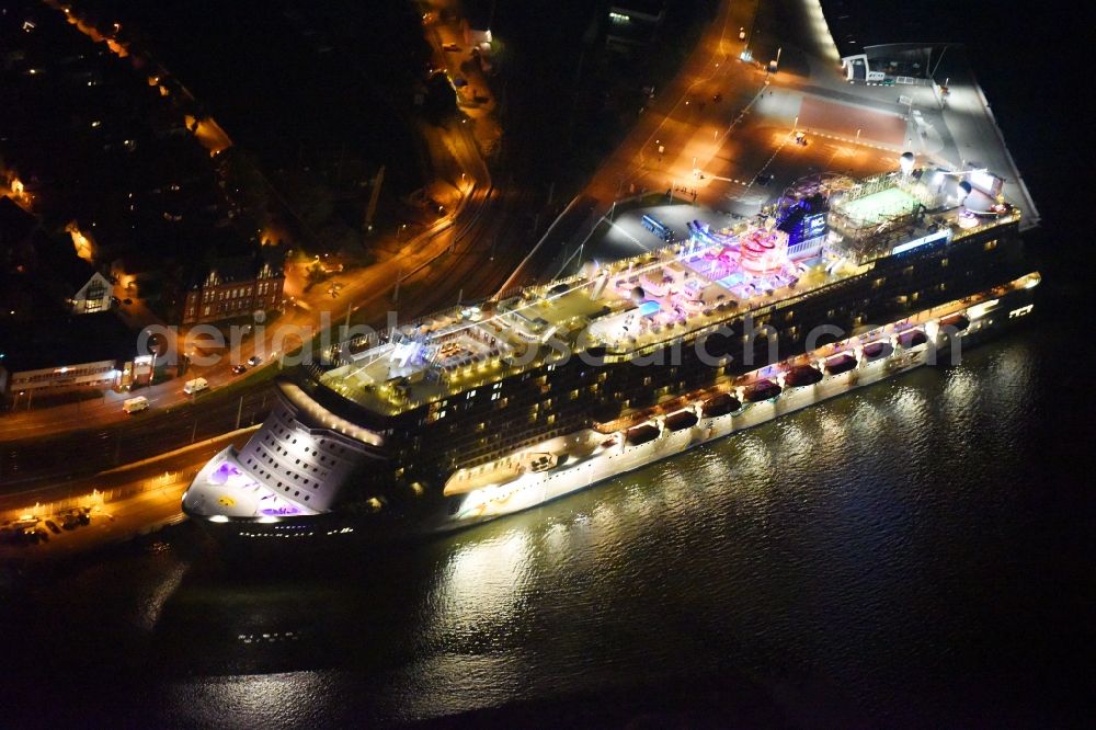 Rostock at night from above - Night lighting Passenger ship Norwegian Getaway in the district Warnemuende in Rostock in the state Mecklenburg - Western Pomerania, Germany