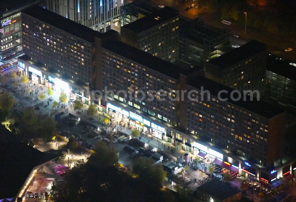 Aerial image at night Berlin - Night lighting Skyscrapers in the residential area of industrially manufactured settlement RathausPassagen in the district Mitte in Berlin, Germany