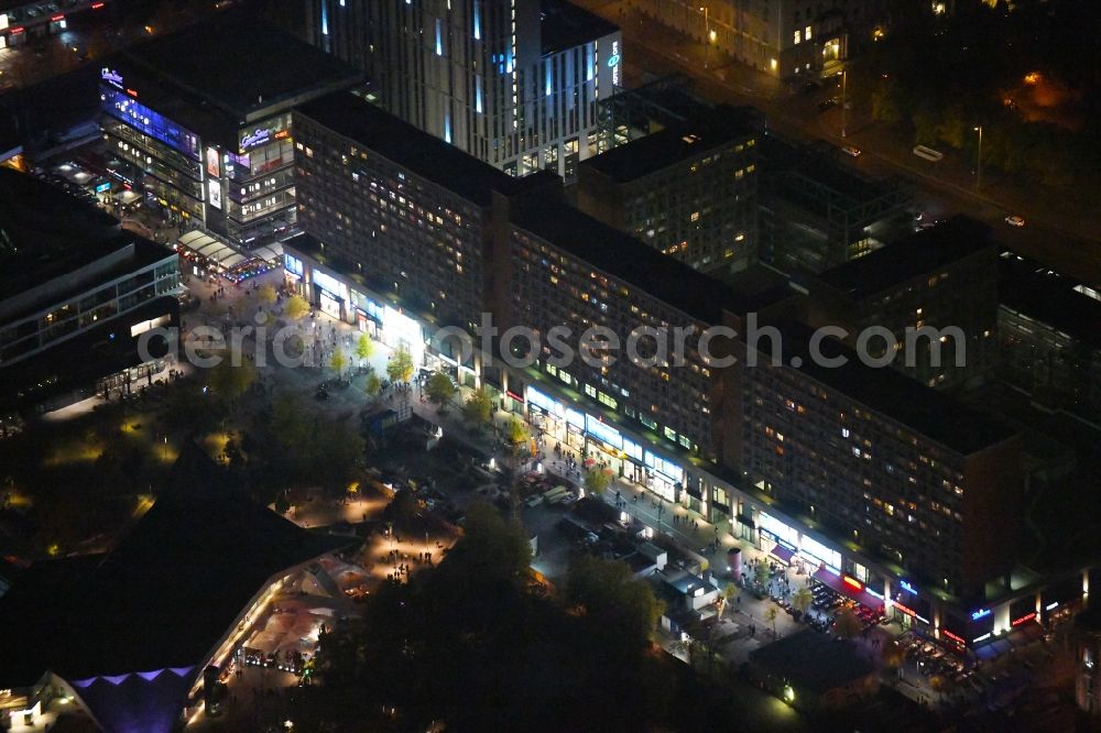 Aerial photograph at night Berlin - Night lighting Skyscrapers in the residential area of industrially manufactured settlement RathausPassagen in the district Mitte in Berlin, Germany