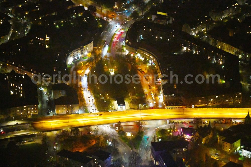 Berlin at night from above - Night lighting Ensemble space Breitenbachplatz on Schorlemerallee in the inner city center in the district Dahlem in Berlin, Germany