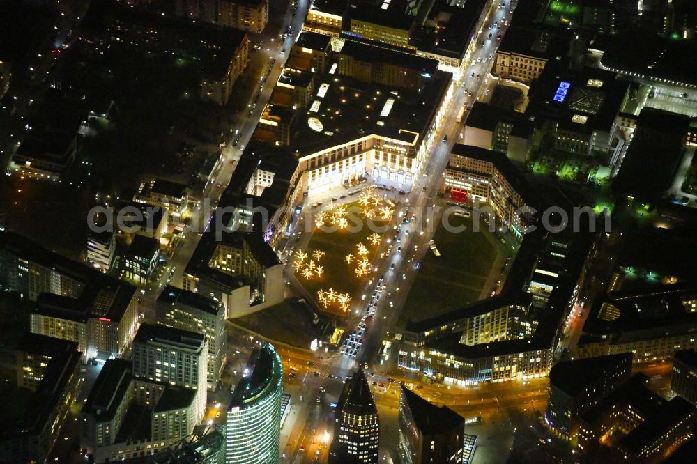 Berlin at night from the bird perspective: Night lighting Ensemble space Leipziger Platz - Leipziger Strasse in the inner city center in the district Mitte in Berlin, Germany