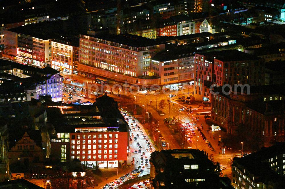 München at night from above - Night lighting ensemble space an place in the inner city center on street Lenbachplatz - Karlsplatz - Elisenstrasse in Munich in the state Bavaria, Germany