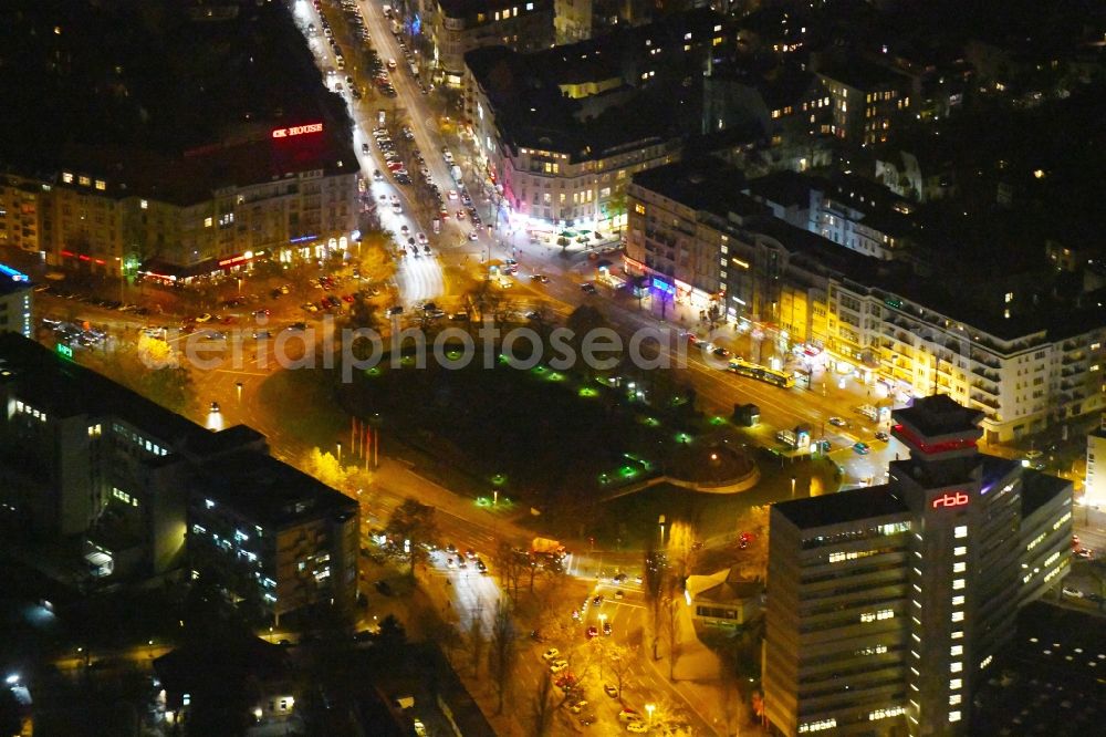 Aerial image at night Berlin - Night lighting Ensemble space Theodor-Heuss-Platz in the inner city center in the district Charlottenburg in Berlin, Germany